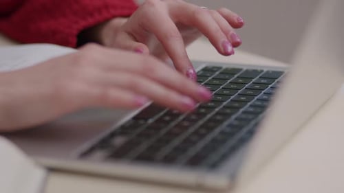 Close up of caucasian woman typing on laptop computer, remote work