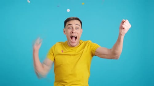 Crazy and Funny Man Dancing As Confetti Falls on Him