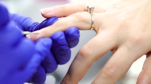 Close Up of Manicure Using Electric File