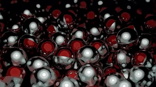 Farbige Metallkugeln bewegen sich im Stapel