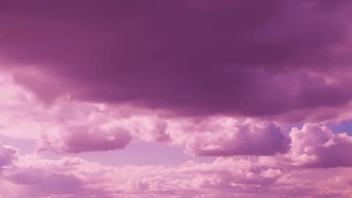 Pink, Purple and Blue Clouds Floating Through Sky