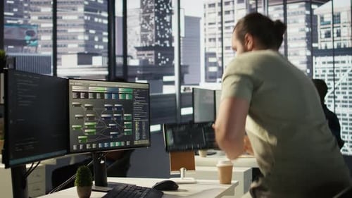 System Administrator Checking Machine Learning Results on Tablet