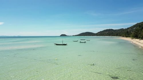 drone fly above pristine clear water in tropical paradise Thailand travel holiday destination in mae