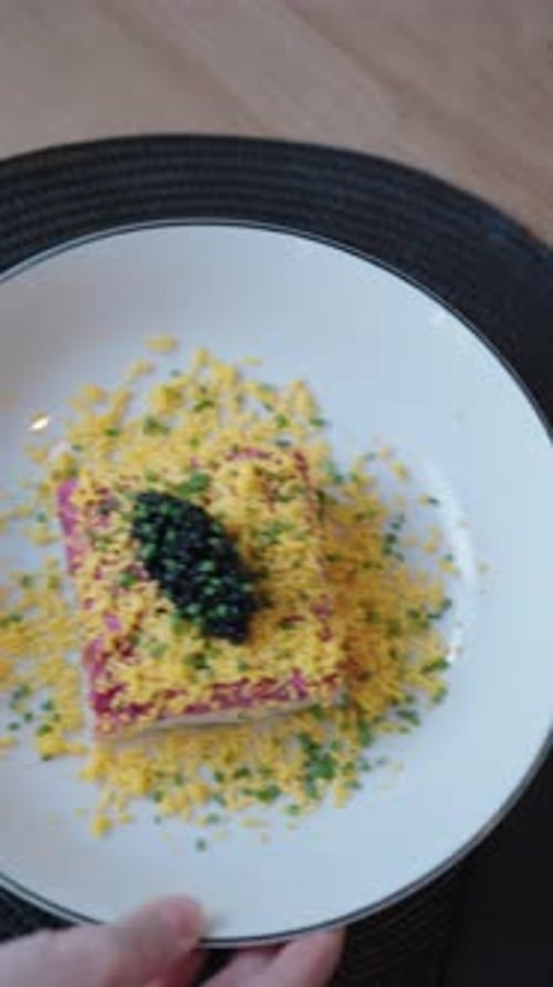 Square Salad Appetizer Topped with Black Caviar