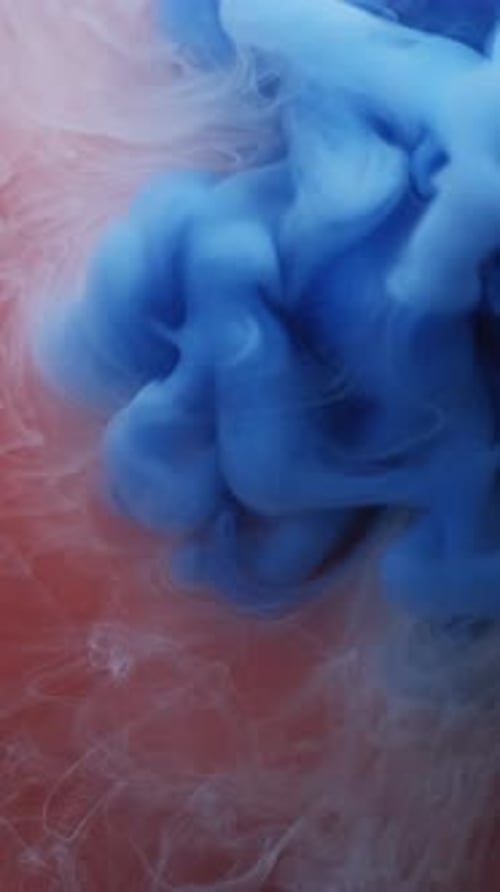 Abstract Blue and White Ink Cloud in Water