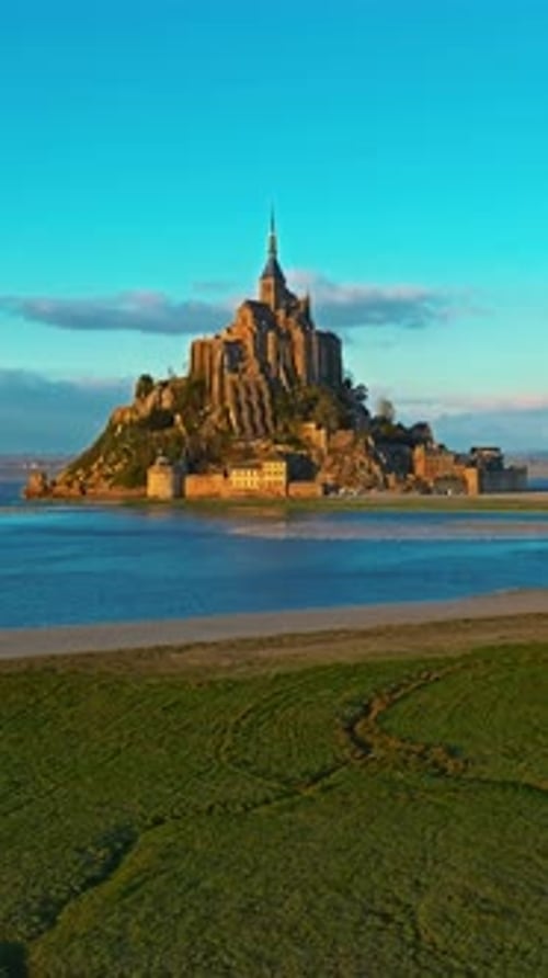 Aerial View of the Famous Historic Abbey Mont Saint Michel Historic Monastery with Tidal Flats