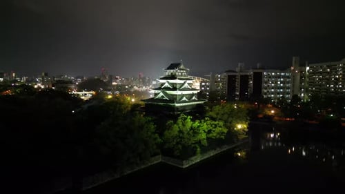Aerial video of the Hiroshima skyline with Hiroshima Castle in Japan