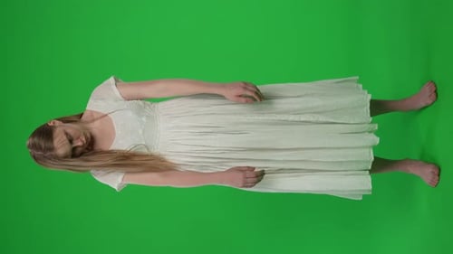 Fullsize Vertical Green Screen Chroma Key Video of a Posessed Female Woman Figure Ghost Poltergeist