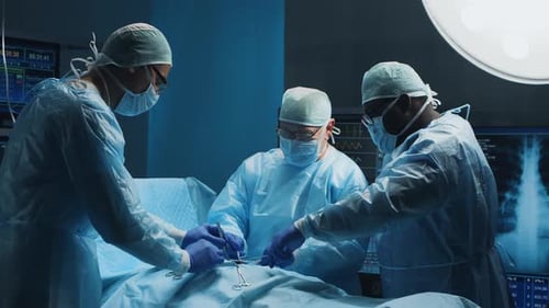 Surgeons Performing an Operation in Operating Room