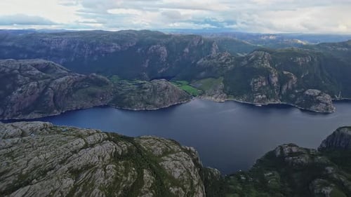 Majestic mountains and pristine fjords in Norway's aerial view.