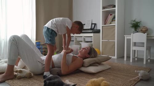 Playful Mother and Child Bonding at Home