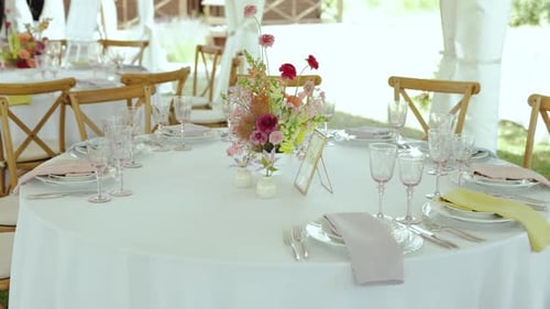 Elegant Tablescape Awaits Guests at a Wedding Reception