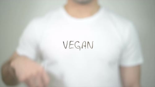 Vegan, Man Writing on Transparent Screen