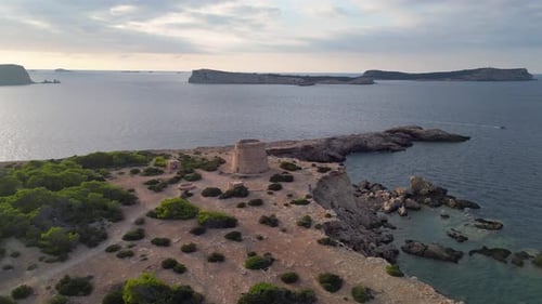 mediterranean coastal sunset ancient historic tower. Fabulous aerial top view flight speed ramp Hype