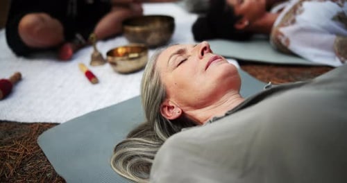 Woman, tibetan bowls or meditation at wellness, retreat or eyes closed as mindful