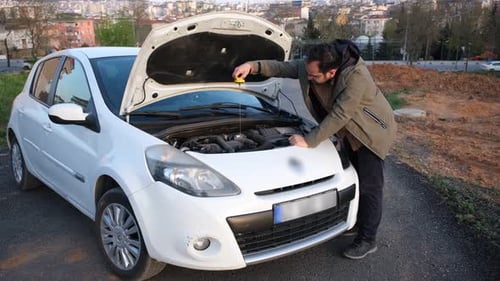 Man Controlling Car