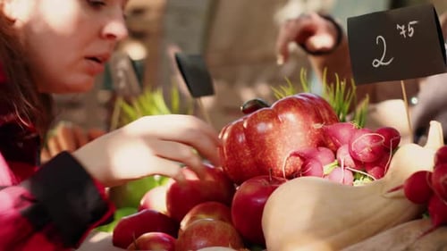 Woman Buying Apples at Farmers Market