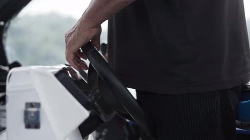 Close Up of Man Driving the Ship's Rudder New Zealand