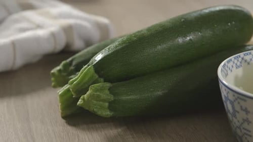 Fresh Green Zucchini on Wooden Surface