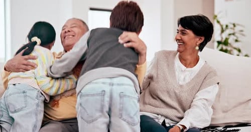 Grandfather Receives Loving Hugs From Grandchildren