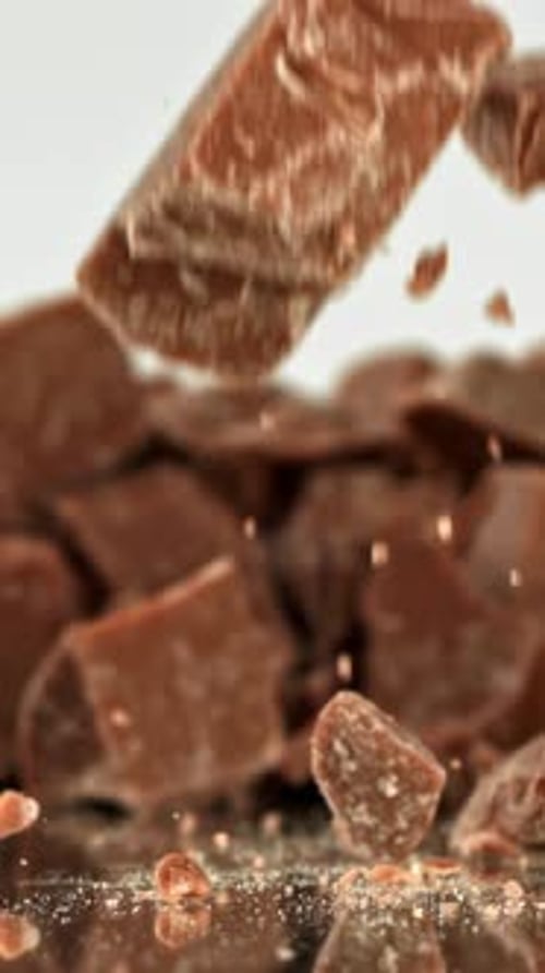 Super Slow Motion Pieces of Dark Milk Chocolate Filmed on a Highspeed Camera at 1000 Fps