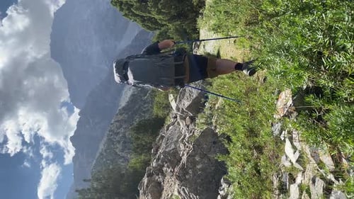 Active Man Climbing Mountain