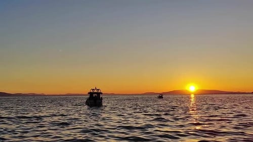 Yellow Sea Sunset Recreational Boat