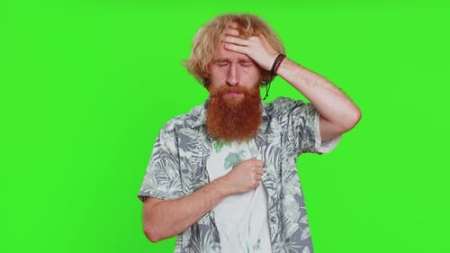 Man Coughing and Pressing Hand to Forehead