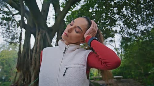 Girl Athlete Warmup Green Park Preparing to Workout Closeup Woman Fitness