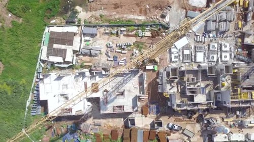 Large residential construction site with cranes, Aerial view