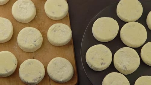 Uncooked Cheesecakes on Cutting Board and Plate