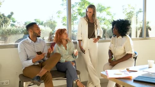 Business People Doing Team Building During Coffee Break at a Coworking