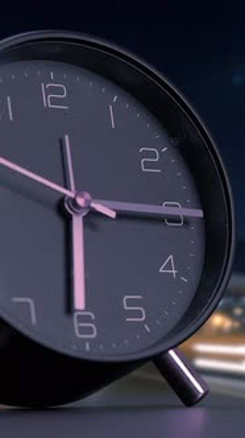 CloseUp of a Beautiful and Elegant Alarm Clock Showcased Under the Soft Glow of Nighttime