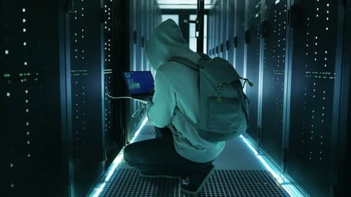 Hacker With Laptop Connects to Rack Server and Steals Information from Corporate Data Center.