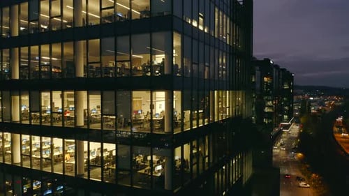 Aerial View of Modern Office Building at Night