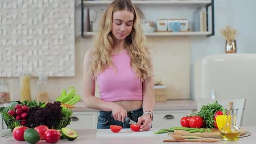 Woman Preparing Healthy Meal in Kitchen