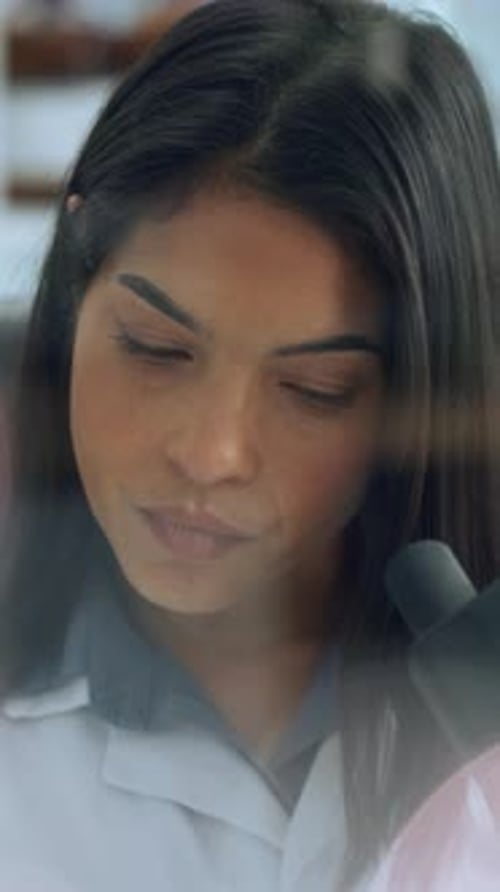 Woman Scientist Working with Microscope in Lab