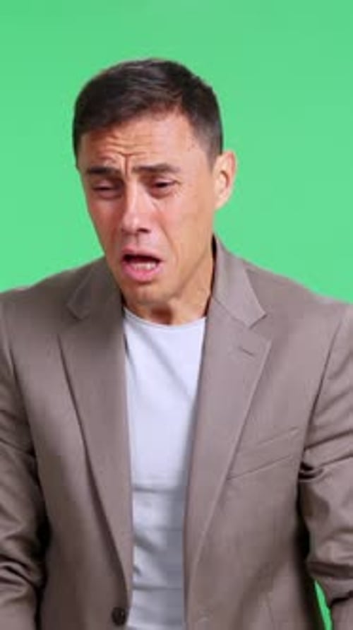 Stressed Businessman Crying in Desperation and Sorrow