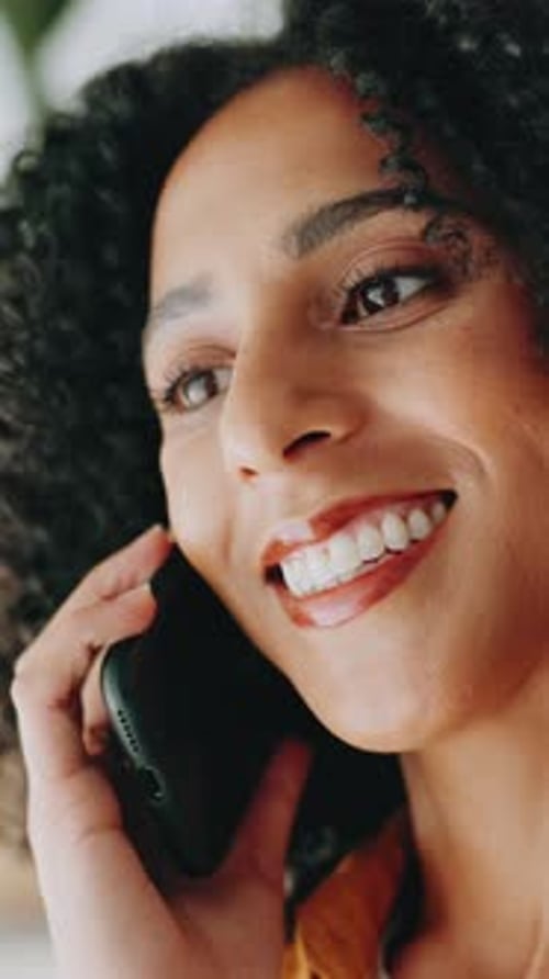 Woman Talking On Phone Close Up Indoors