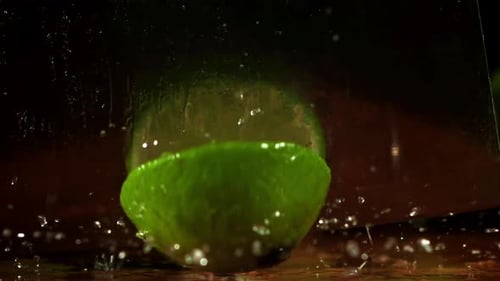 Fresh Lime Being Sliced in a Close Up Shot