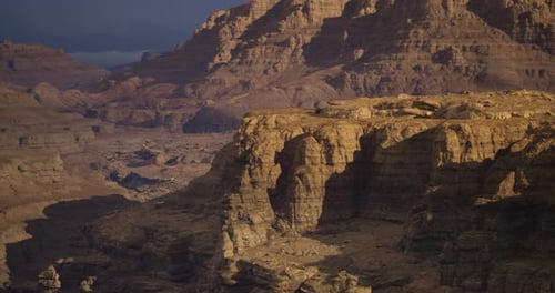 Breathtaking View of Rugged Canyons During Twilight Hours in a Desert Landscape