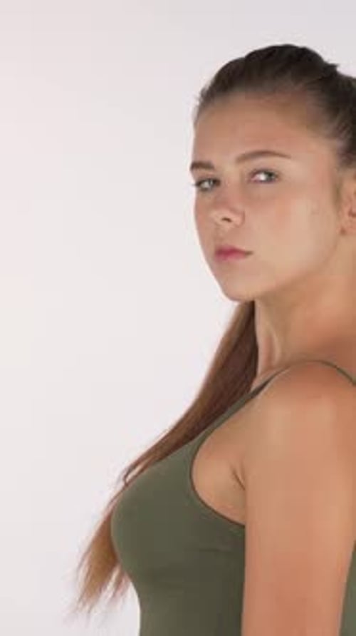 Beautiful Woman Experiencing Back Pain Gently Rubbing Her Shoulder