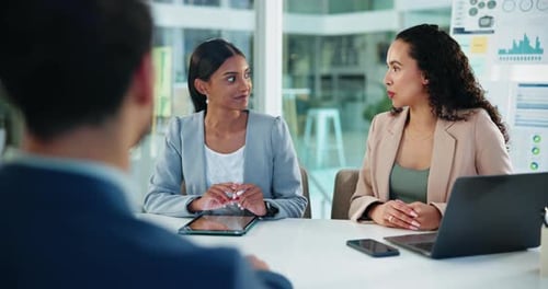 Young Adults Collaborate at Business Meeting