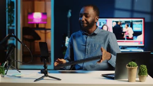 Man at Desk Chatting Online