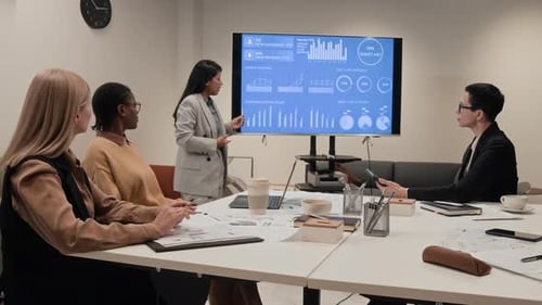 Business Presentation by Woman in Corporate Meeting Room