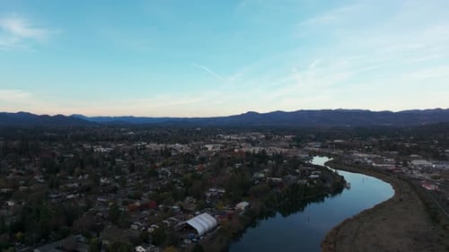 Drone aerial view of downtown Napa, California at sunset in the spring