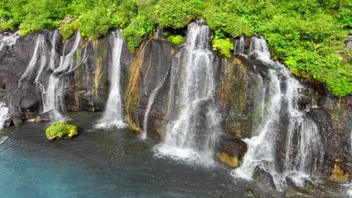 Summer Waterfall Many Small Streams Flow From the Lava Field River with the Purest Glacial Water of