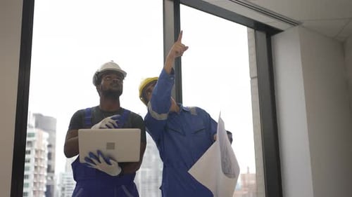 Engineers are working at tower.