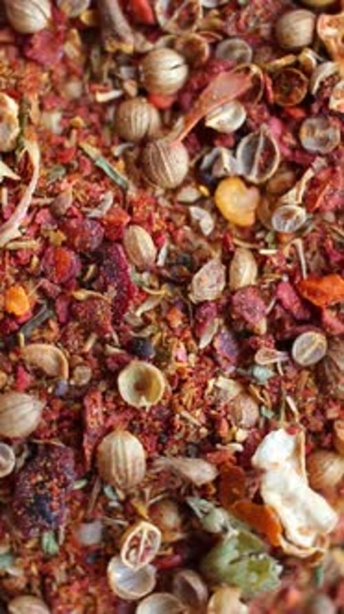Background of Mixed Spices Close Up Rotating Top View Vertical Video