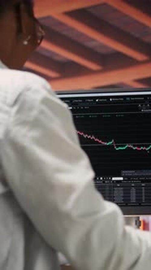 Vertical Video Happy Day Trader Using PC Satisfied After Purchasing Well Performing Stocks